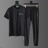 Camiseta para hombres Pantalones negros Unisex Traje Top Top Tople de tripulación de manga corta más talla asiática