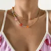 2022 Collana di perline di riso fiorellino color vento dolce per donna Collana di clavicola a catena in metallo semplice Hip Hop