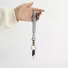 Mode tissé à la main porte-clés pendentif accessoires bricolage Boho bracelet coton corde ornement Crochet porte-clés lanière cadeau de vacances