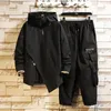 Tute da uomo Hip Hop Tuta da uomo Set Pantaloni Cerniere Tasche Capispalla Streetwear Giacca a vento Giacche e pantaloni 2 pezzi AbbigliamentoUomo