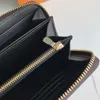 Модные цветы дизайнерские кошельки роскоши мужчины женщины кожаные сумки высококачественные классические буквы ключевая монетная кошелек для клетки для клетки сумочка с ori 221i