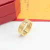 2022 Brand Designer de luxo Stainless Steel Band Rings Jóias de festa da moda 18K Gold Rose Men Women Lovers Wedding Promise Ring Presentes