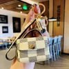 Plaid Lederschlüsselketten Ring Schmuck braun Quasten weniger Bluetooth Kopfhörer Case Auto Keyrings Halter Fashion Keychains Accessoires Cute3296067