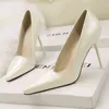 fashion sexy nightclub women's thin high heels shallow mouth pointed transparent color matching hollow out single shoes