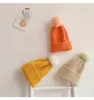 Autunno Inverno Bambino Bambini Cappelli lavorati a maglia Palla di pelo Berretti con teschio Color caramella Bambini che lavorano a maglia Cappello a cuffia caldo