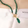 Hanger kettingen verkopen ornament met malachitische bladeren parel drop ketting armbanden persoonlijkheid retro mode sieraden voor vrouwelijke verjaardag