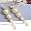 Baumeln Kronleuchter Verkauf Runde Perlen Lange Ohrring Großhandel Einfache Mode Trend Tropfen Ohrringe Hochwertige Schmuck Zubehör Für FrauenDa
