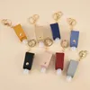 Nyckelringar Läcksäker hand sanitizer Plast Keychain Bottle Key Ring Läder tom resor 30 ml tofsar med SMAL22