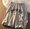 Vintage streetwear brev broderi elastisk midja lösa mens shorts nya sommar avslappnade par fempunktshorts