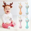 Baby Music Flashing Rattles Toys Infant Cute Rabbit Hand Bells Early Educational Toys 012M Pink Orange Green Blue 220531