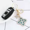 2021 Exquis Clover Key Chain Creative Full Full Rinestone Keychain Fashion Course Femme Bag Sac Charme Pendant Car Key Anneau entier A4818521