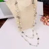 Chaînes bijoux coréens hiver fleur pull chaîne longue perle collier pendentif Double femme colliers pour femmeschaînes Elle22