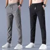 Pantalon en soie de glace pour hommes couleur unie taille moyenne ample respirant jambe droite décontracté mince pantalon de sport à séchage rapide 220810