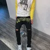 Pantalones vaqueros para hombre, pantalones vaqueros ajustados con agujeros destruidos y grabados, pantalones pitillo negros rasgados, pantalones pitillo de mezclilla estilo Punk callejero