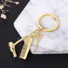 Porte-clés créatif sèche-cheveux ciseaux peigne pendentif porte-clés cadeau porte-clés porte-bijoux cadeaux