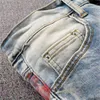 Mens Jeans Designer Amirrs Jeans Ny ljusfärg Personlig stänkfärgpunkt Kniv Knur Cut Hole Men's Fashion Märke Korean Slim Legged Pants Be8e