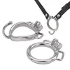 Dispositifs de chasteté en acier inoxydable Cock Bague avec oreilles et courroie de sangle PU pour une cage assortie qui utilise un système de verrouillage intégré