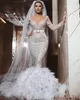 2022 Luxury Sparkly Mermaid Wedding Dresses V Neck Sequins Beaded Feather Long Sleeves Bridal Gown Tiered Ruffles Sweep Train Vest238T
