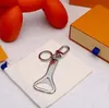 Metalen flesopener Keychains mode individualiteitsleutel hanger hoogwaardige auto -ketting paren kleine sieraden cadeau accessoires sleutelring