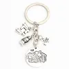 Keychains 1pc Camping Road Sign Charms Keychain Lantern Telescope Mountain Keyring sieraden Handgemaakte hele E21355963158