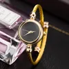 Montreuses-bracelets Gold Creative Womens Bracelet Watchs Ladies Habille Fashion Alliage Quartz Corloge de bracelet Giftwristwatches