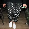 pantaloni a pois neri