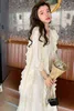 Koreański styl wiosna luźna elegancka sukienka macierzyńska falbanki długie rękawy w ciąży kobieta syrena sukienka słodka trąbka sukienki J220628