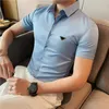 Moda Man Shirts Casual Designer Polos Camisetas camisetas de verão com letras Budge de manga curta Mens de tamanho asiático -5xl