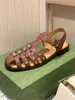 Lato Nowe retro dhinestone splecione palce sandały damskie płaskie puste skórzane słowo rivet Pasek rzymskie buty