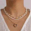 Collana girocollo fiore Boho Collane con perline di riso Gioielli per girocolli da donna e da ragazza