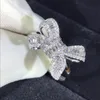 Anillos de banda de diseño de arco encantador de moda para boda anillo de lujo de cristal brillante con piedra de diamante CZ para mujer