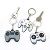 100 ADET PVC yeni stil Oyun Makinesi anahtarlık Anahtarlık Sevimli Gamepad Joystick Anahtarlık Anahtarlıklar Çanta Araba Asılı fit erkekler boy tuşları