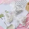 Cadeau cadeau 10x14cm évider feuille blanche coton sac organza cordon sacs bijoux bonbons biscuits pochette d'emballage 24pcsgift