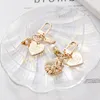 Creative Cute Shell Conch Pearl Keychain Charms Strap Women Charm Bag Trinket Metal Letter Heart Car Keyring Friends Gift AirPods Accessories