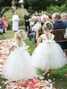 Biała suknia balowa sukienki z paskami z paskami Wstążka na zewnątrz sukienki na przyjęcie weselne dla dzieci Toddler Formal Birthday Communion Dress Tiulle Tutu spódnica CL0515