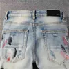 Mens jeans designer Amirrss Jeans new light color personalized splash paint point knife cut hole men's fashion brand Korean slim legged pants BE8E