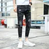 Jeans masculinos do homem belo homem de homem coreano, tendência elástica de tornozelo amarrado