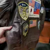 17 Etykieta haftowa swobodna pikowana skórzana kurtka bombowca męska męska pistolet