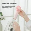 Summer new handheld fan USB charging portable mini fan foldable handheld desktop placed dual-purpose electric fans lithium battery large capacity