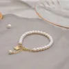 Link Chain Natural Freshwater Pearl 4-5 mm högkvalitativa armband med lycka till charm dekoration kvinnor smycken