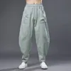 Pantalon en coton et lin pour hommes taille élastique solide Streetwear Joggers Baggy pantalons de survêtement style chinois pantalon décontracté hommes