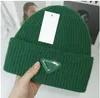 Lyxiga m￶ssa designer vinter b￶nor m￤n och kvinnor modedesign stickade hattar fall ull cap brev jacquard unisex varm skalle hatt