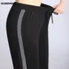 Oumengka Contrast Panel Sweatpant Casual Harem Byxor Lösa Elastiska Byxor Svart Striped Side Sweat Kvinna 220325