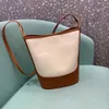 High quality Bags Minority hit color canvas spliced bucket bag women's spring large-capacity 2022 new one shoulder handbags Tote
