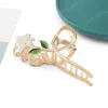 Pinces à cheveux en métal fleur de lys élégantes pour femmes pince à cheveux queue de cheval épingles à cheveux barrette de bain accessoires de cheveux