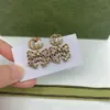 Boucles d'oreilles papillon en or européen et américain designer pour femmes bijoux de haute qualité bijoux de mariage de luxe avec boîte