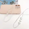 Accessoires de mode perles d'amour sangle téléphone charme coloré coeur acrylique téléphone chaîne lanière en forme de coeur perle corde cordon suspendu