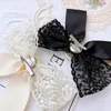 Tissu coréen dentelle noeud papillon broches pour femmes strass cristal col de chemise broches Cravat Corsage bijoux de mariage de luxe