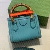 2023 حقيبة تسوق فاخرة بتصميم ديانا بامبو عالية الجودة حقيبة جلد أصلي للنساء والرجال حمل حقيبة تسوق عصرية بجيوب بطاقة محفظة