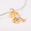 Shine Gold Color Padlock och Key Dangle Charm 925 Sterling Silver Pärlor för smycken Makande Fit Original Armband Fashion DIY 760088C01 780088C01 790088C011216505